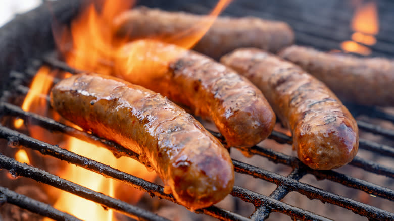 Close up of sausages on grill