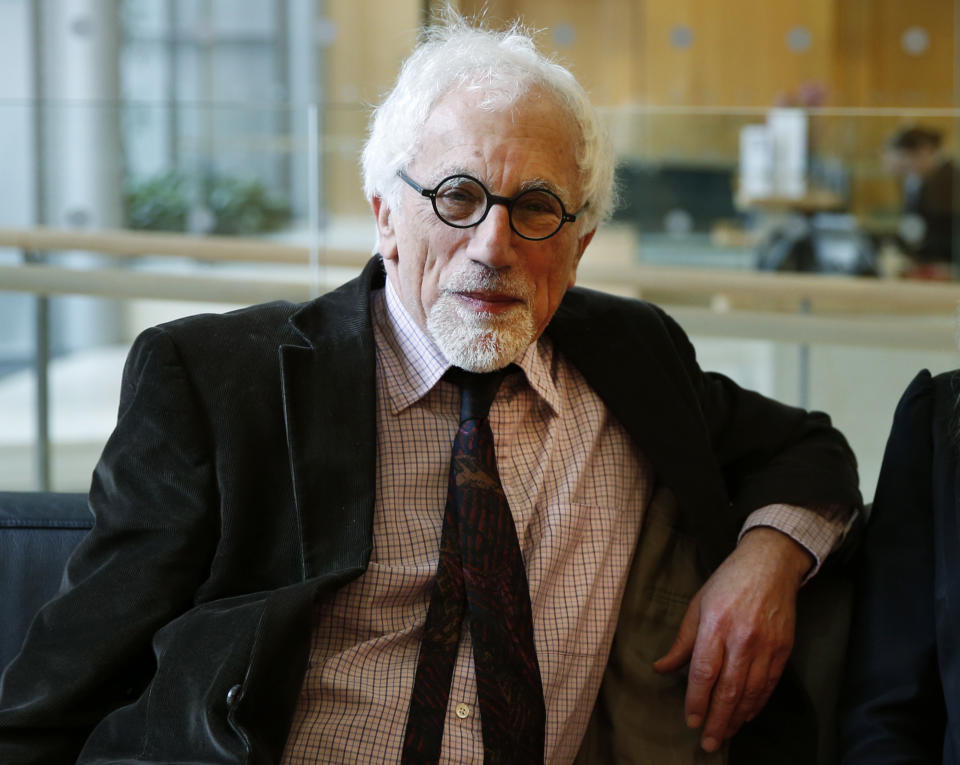 Joe Herbert, left, Emeritus Professor of Neuroscience at the University of Cambridge poses for the photographer prior to a news conference to announce the results of a new study in central London, Monday, Feb. 17, 2014. A saliva test for teenage boys with mild symptoms of depression could help predict those who will later develop major depression, the new study says. Researchers who measured cortisol levels in teenagers found that boys with high levels of the hormone and mild depression symptoms were 14 times more likely to later suffer from clinical depression than those with low levels. Herbert said: "You don’t have to rely simply on what the patient tells you, but what you can measure inside the patient," comparing the new test to those done for other health problems, like heart disease, which evaluate things like cholesterol and high blood sugar to determine a patient’s risk. (AP Photo/Lefteris Pitarakis)