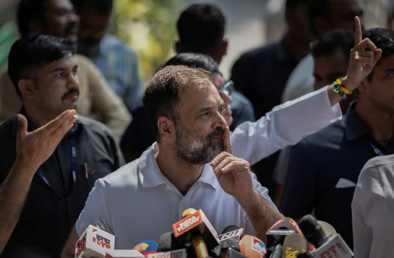 Congress party celebrate after the initial poll results in Karnataka elections at the party headquarters in New Delhi