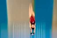 LONDON, ENGLAND - AUGUST 09: Roseline Filion of Canada competes in the Women's 10m Platform Diving Semifinal on Day 13 of the London 2012 Olympic Games at the Aquatics Centre on August 9, 2012 in London, England. (Photo by Adam Pretty/Getty Images)