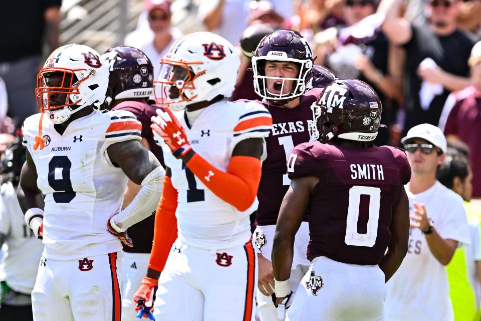 Texas A&M quarterback Max Johnson celebrates after throwing a touchdown pass to his brother Jake in last week's win over Auburn. Johnson has assumed starting quarterback duties with the season-ending injury to Connor Weigman.