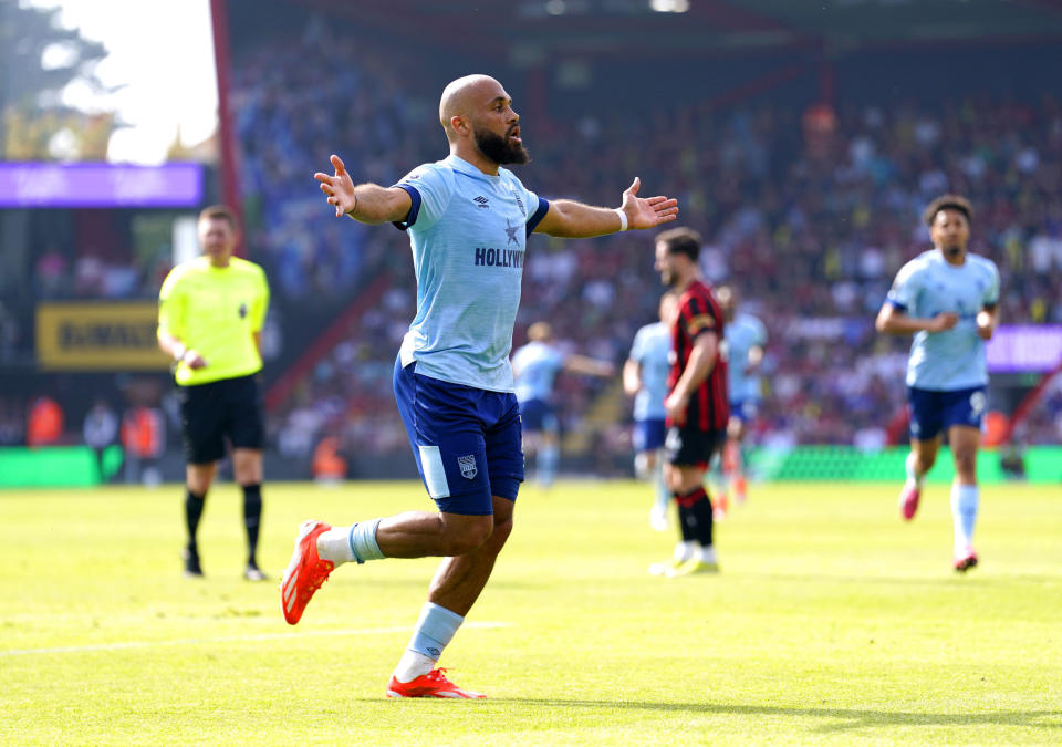 Brentford's Bryan Mbeumo celebrates scoring their side's first goal, during the English Premier League soccer match between Brentford and Bournemouth, at the Vitality Stadium, in Bournemouth, England, Saturday, May 11, 2024. (Andrew Matthews/PA via AP)