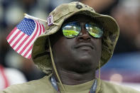 A a fan waits for the start of the World Cup round of 16 soccer match between the Netherlands and the United States, at the Khalifa International Stadium in Doha, Qatar, Saturday, Dec. 3, 2022. (AP Photo/Ebrahim Noroozi)