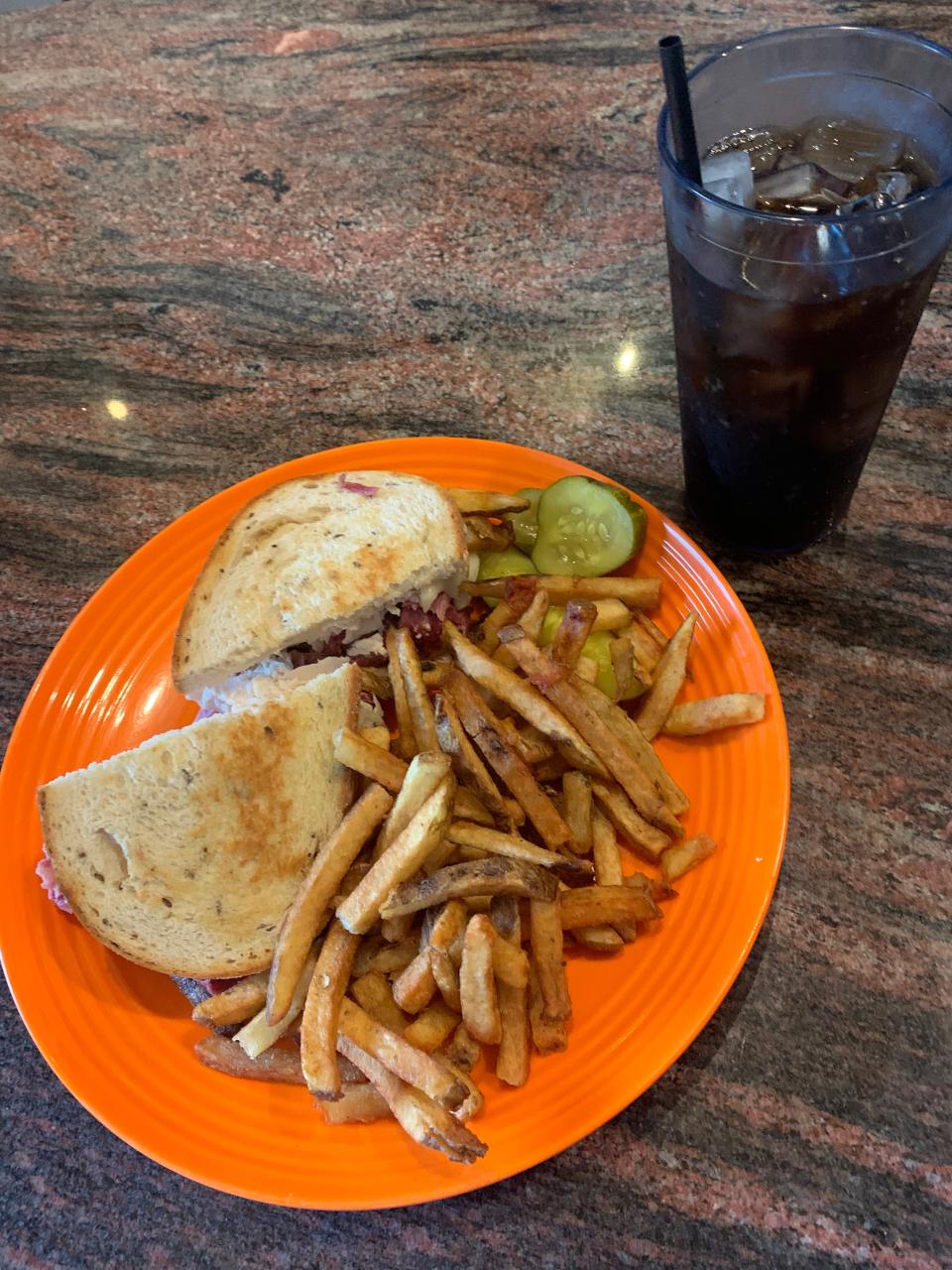 The Spare Parts sandwich at Gasoline Alley features corned beef, turkey and swiss cheese on grilled rye.