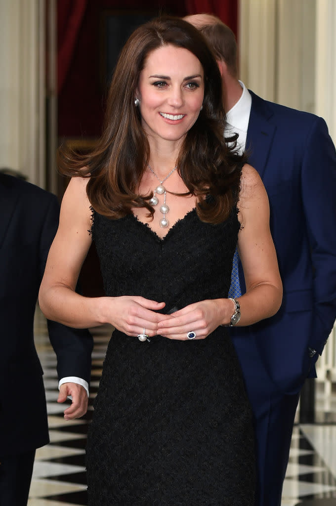 <p>The Duchess looked elegant at her first engagement in Paris with this black Alexander McQueen and oversized pearls. </p>