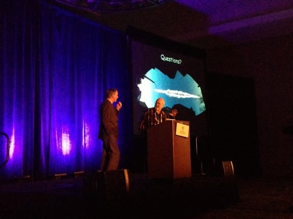 During the October gathering of the American Astronomical Society's 2013 Division for Planetary Sciences meeting, Sandia National Laboratories asteroid expert Mark Boslough (left) answers questions regarding the Russian space rock that detonate