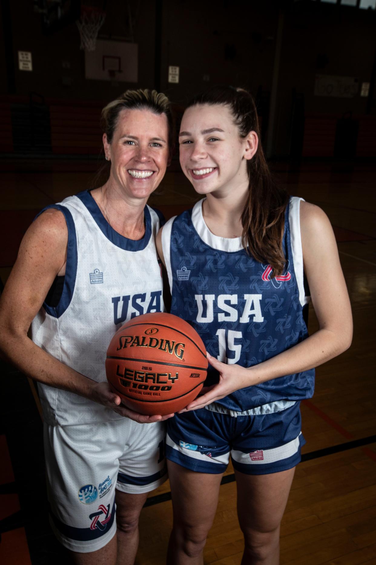 Carolyn Dorfman of Mamaroneck and her daughter Addison, 15, both won medals in basketball at the Maccabi Pan-Am Games in Argentina over the holidays. Caroline played on the USA open team, and Addison played on the USA U18 team. When countries pulled out over security concerns, Addison's team was forced to play against adult teams, including playing against her mother. They were photographed at Mamaroneck High School Jan. 15, 2024.
