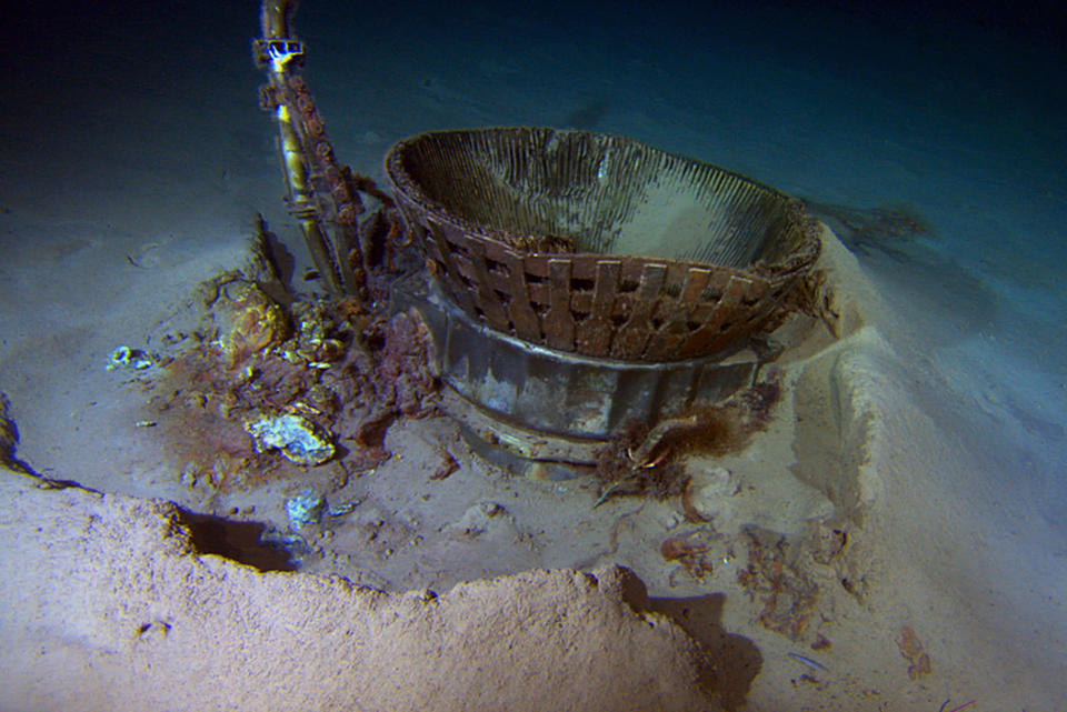 A thrust chamber from an Apollo F-1 engine rests on the ocean floor (Reuters)