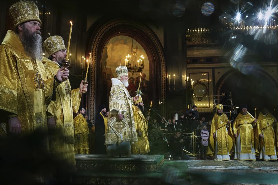 In this photo released by Russian Orthodox Church Press Service, Russian Orthodox Patriarch Kirill, center, delivers the Christmas service in the Christ the Saviour Cathedral in Moscow, Russia, on Saturday, Jan. 6, 2024. While much of the world has Christmas in the rearview mirror by now, people in some Eastern Orthodox traditions celebrate the holy day on Sunday. Jan. 7, 2024. (Oleg Varov, Russian Orthodox Church Press Service via AP)