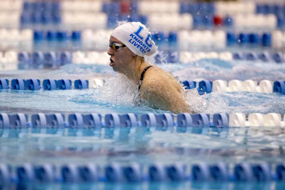 Lexington Catholic’s Libby Livesay competes at the Region 8 swim meet. She won the individual events for the 50-yard freestyle and 100-yard breaststroke and was also part of two winning relays.