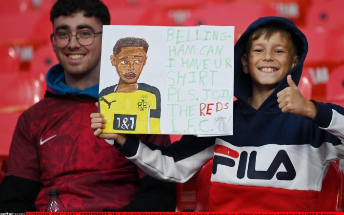  A young England fan holds up a Jude Bellingham sign - Justin Setterfield - The FA/The FA via Getty Images