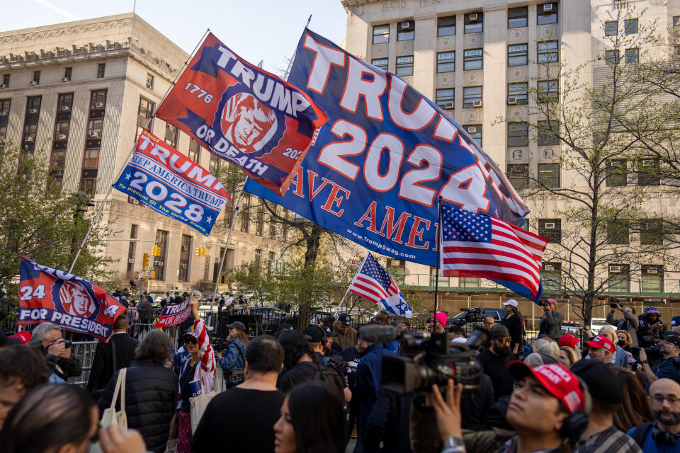 Trump supporters gather at Collect Pond Park near Manhattan Criminal Court on Monday.