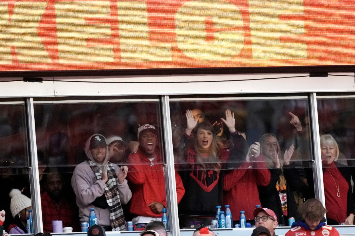 Taylor Swift watches from a suite during the first half of an NFL football game between the Kansas City Chiefs and the Buffalo Bills Sunday, Dec. 10, 2023, in Kansas City, Mo. (AP Photo/Charlie Riedel)