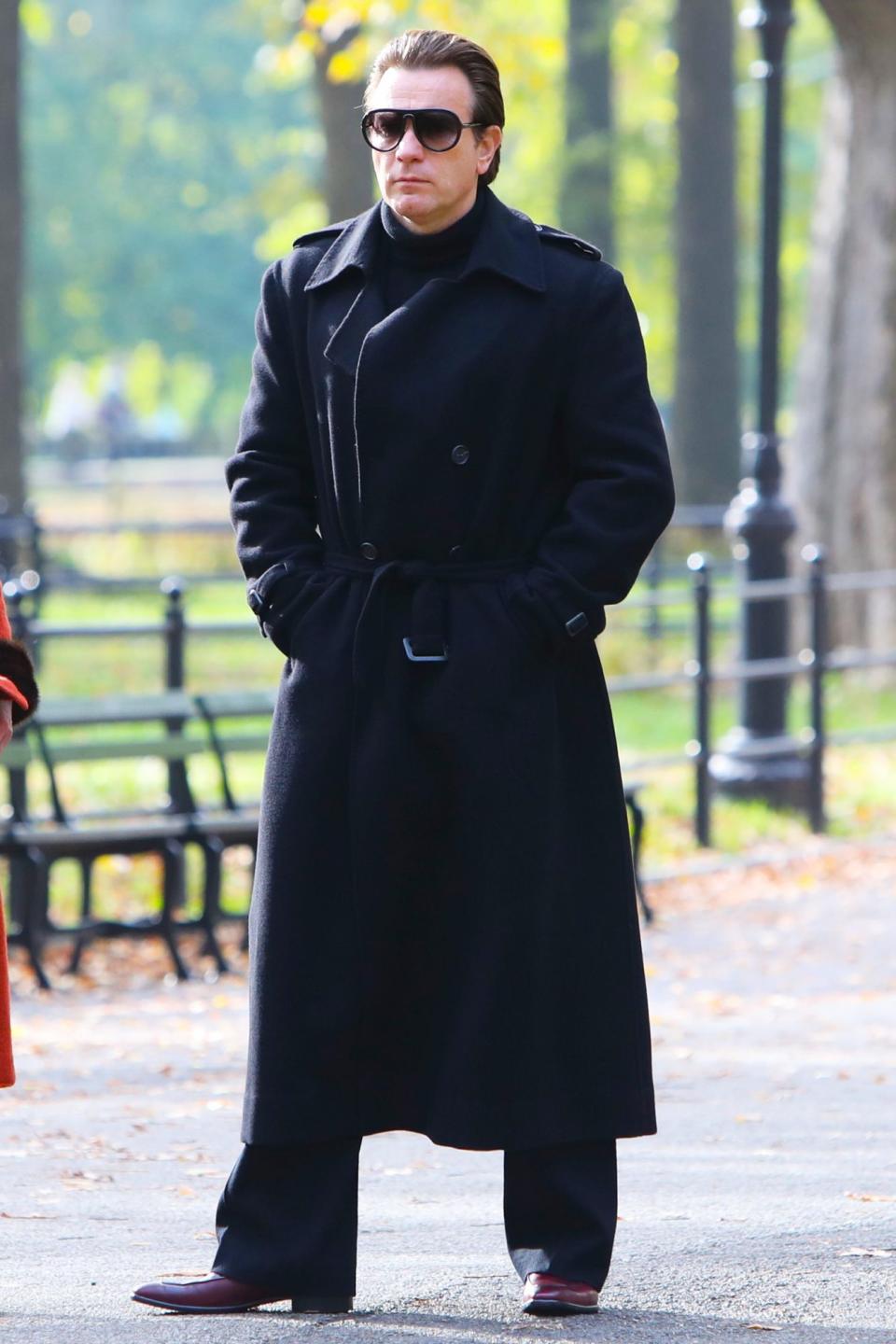 <p>Ewan McGregor goes incognito in all black while on the set of <em>Simply Halston </em>in N.Y.C. on Thursday.</p>