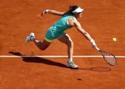 Samantha Stosur of Australia plays a shot to Amandine Hesse of France during their women's singles match at the French Open tennis tournament at the Roland Garros stadium in Paris, France, May 27, 2015. REUTERS/Vincent Kessler