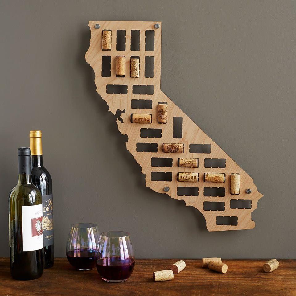 <p>Uncommon Goods</p><p><strong>$35.00</strong></p><p>This can be purchased in the shape of any of the 50 states—maybe your home state or the one with your favorite wine region. Suddenly memories from your favorite nights spent over a bottle of wine become artwork.</p>