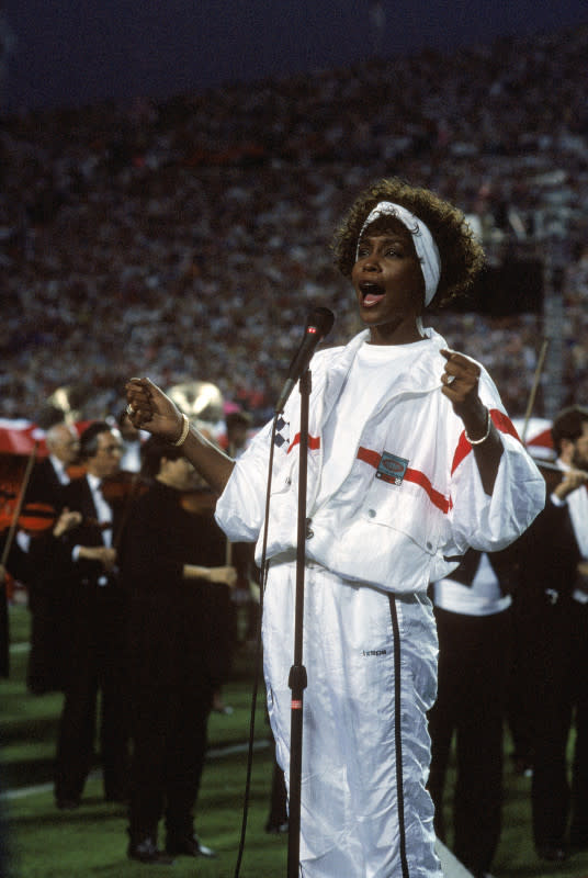 Whitney Houston performs the national anthem at Super Bowl XXV on Jan. 27, 1991.<p>George Rose/Getty Images</p>