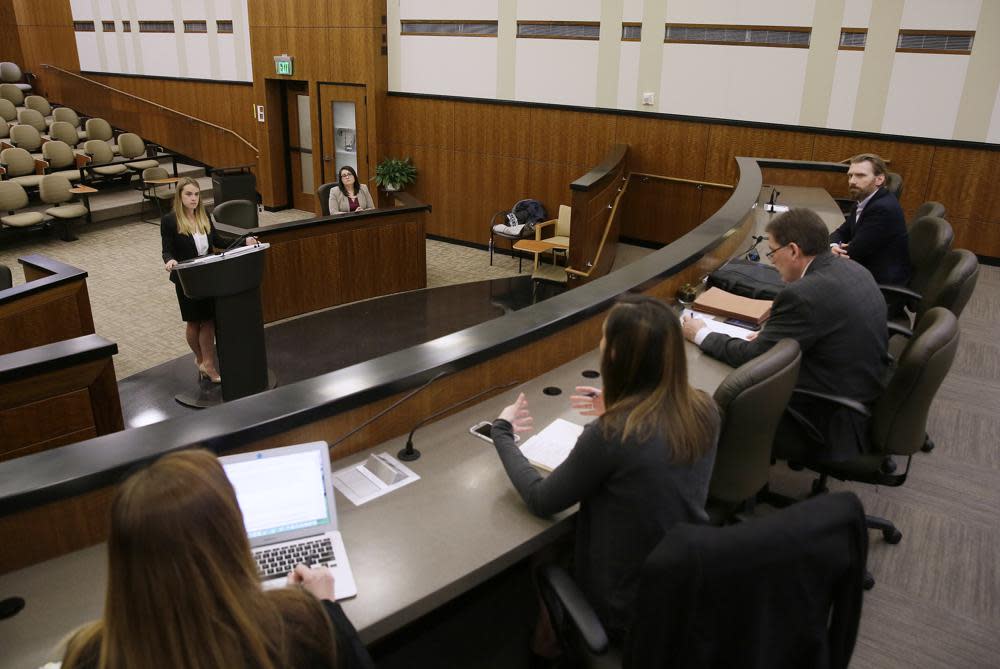 Student Michelle Freeman, top left, practices her argument in a moot courtroom at the University of California, Hastings College of the Law in San Francisco on March 13, 2017. (AP Photo/Eric Risberg, File)