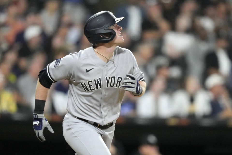 New York Yankees' Billy McKinney watches his RBI sacrifice fly off Chicago White Sox relief pitcher Lane Ramsey during the seventh inning of a baseball game Monday, Aug. 7, 2023, in Chicago. Aaron Judge scored on the play. (AP Photo/Charles Rex Arbogast)