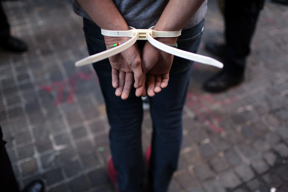 Protesters are arrested during 'Occupy Wall Street' demonstrations on September 17, 2012 in New York City. The 'Occupy Wall Street' movement, which sparked international protests and sympathy for its critique of the global financial crisis, is commemorating the first anniversary of its earliest protest. The main protest began in front of the New York Stock Exchange and was preceeded by a series of days where free courses were offered on such topics as Marxism, anarchism, education and finance. (Photo by Spencer Platt/Getty Images)