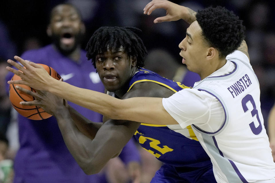 Kansas State guard Dorian Finister (3) pressure South Dakota State forward William Kyle III during the first half of an NCAA college basketball game Monday, Nov. 13, 2023, in Manhattan, Kan. (AP Photo/Charlie Riedel)