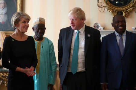 Britain's Foreign Secretary Boris Johnson poses for a photograph before a meeting with the Zimbabwe and other African delegations at the CHOGM conference in London, Britain, April 20, 2018. REUTERS/Hannah McKay