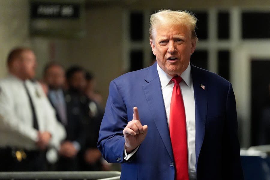 Former President Donald Trump speaks to members of the media before entering the courtroom at Manhattan criminal court, Monday, May 6, 2024, in New York. (AP Photo/Julia Nikhinson, Pool)