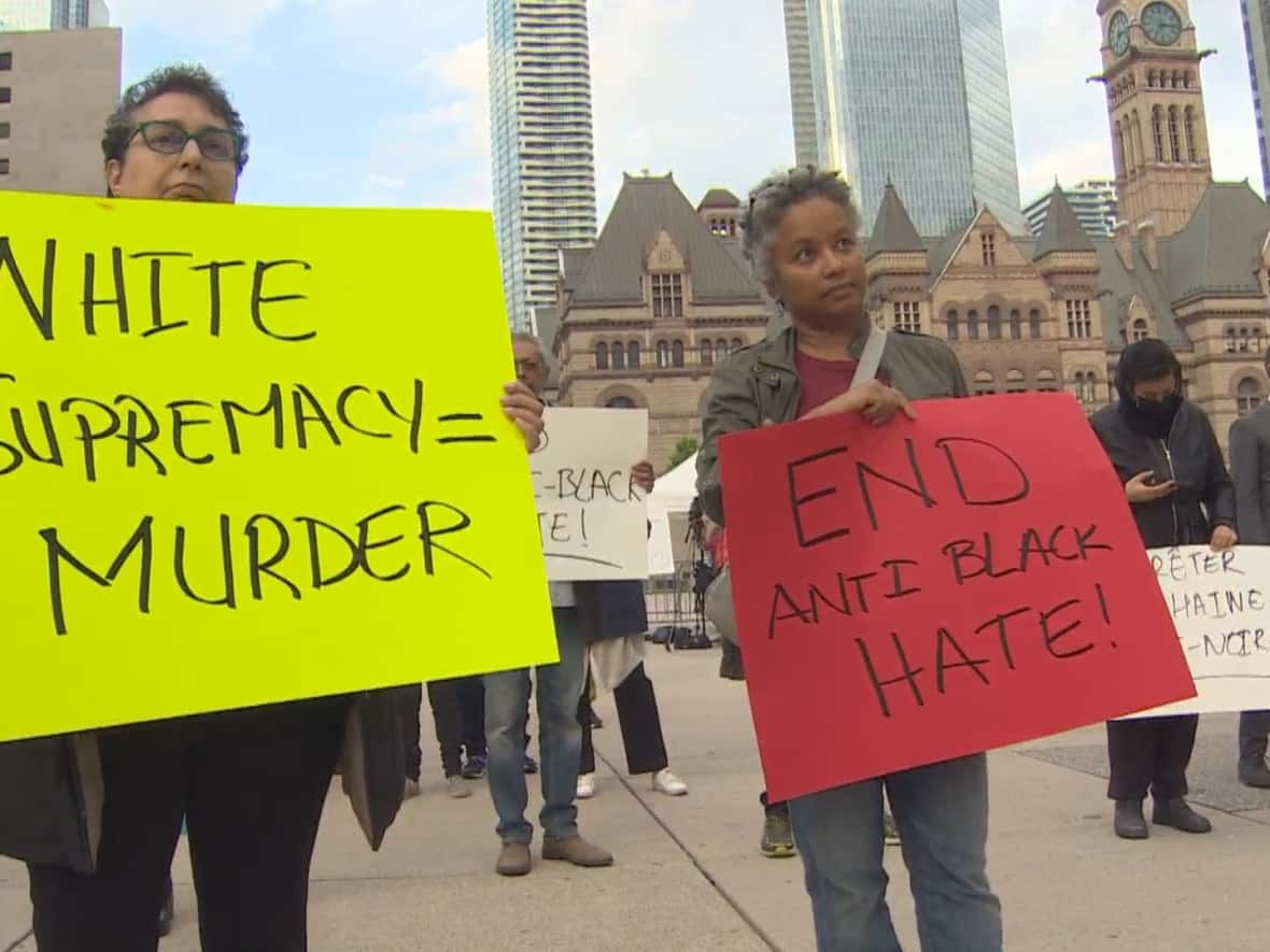 Toronto residents attended a vigil in Nathan Phillips Square on Thursday night to show solidarity with the mass shooting victims in Buffalo. (CBC - image credit)