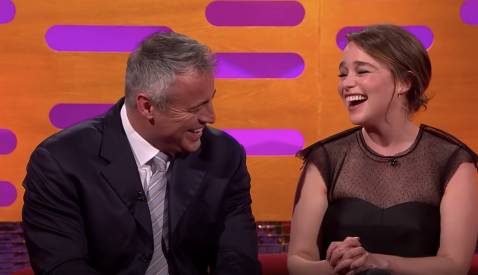 Matt LeBlanc laughing with Emilia Clarke