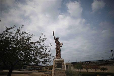 A scaled-down version of the Statue of Liberty is seen in downtown Gary, Indiana, September 6, 2013. REUTERS/Jim Young