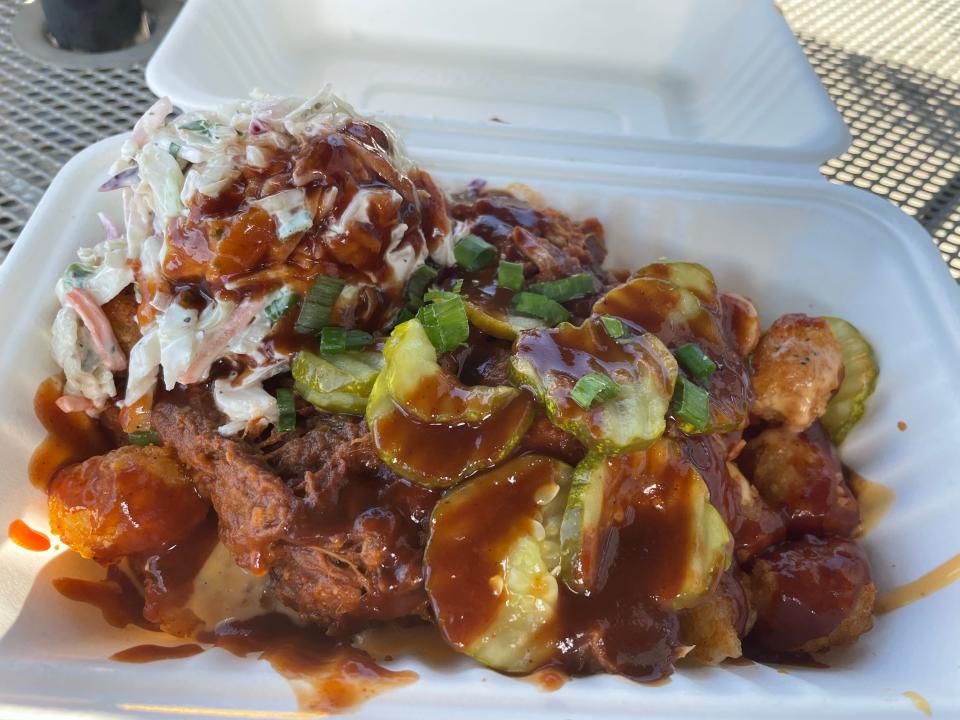 The Scott's Tots food truck makes daily stops in Blount County and surrounding areas. The BBQ PorkTot consists of tots topped with smoked, pulled barbecue pork, Scott’s Tots’ signature cheese sauce, diced green onions and barbecue sauce. It’s served with a side of coleslaw.