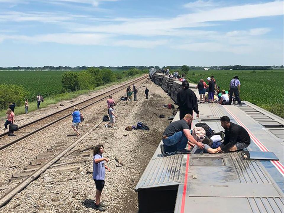 There were 275 passengers aboard the train when it crashed in Mendon, Missouri, on Monday (AP)