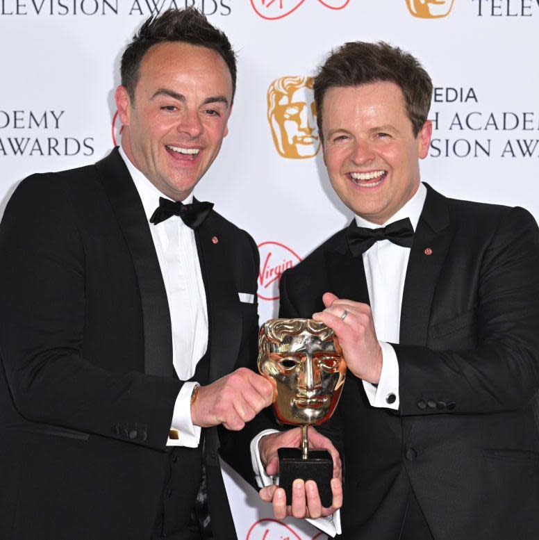 Ant and Dec holding a bafta