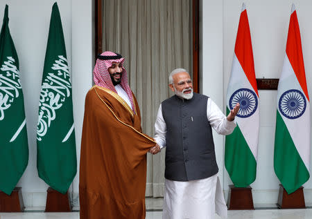 FILE PHOTO: Saudi Crown Prince Mohammed bin Salman shakes hands with Indian Prime Minister Narendra Modi in New Delhi, India, February 20, 2019. REUTERS/Adnan Abidi/File Photo