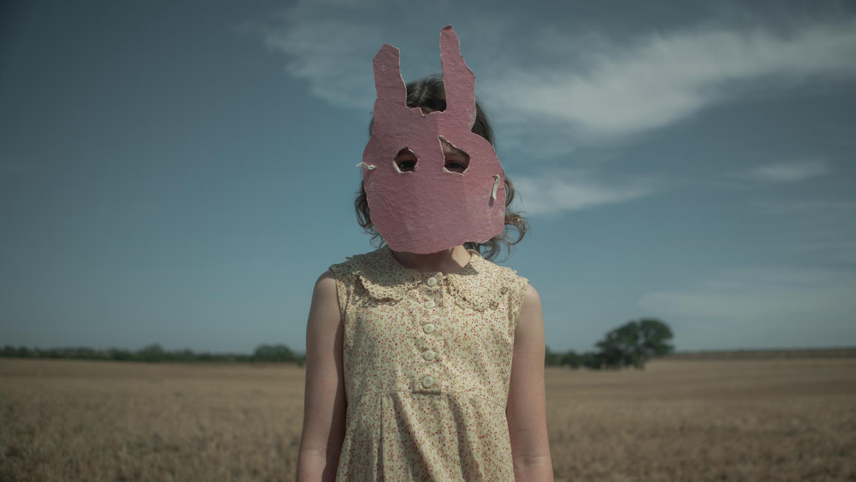  Run Rabbit Run star Lily LaTorre wearing a rabbit mask 