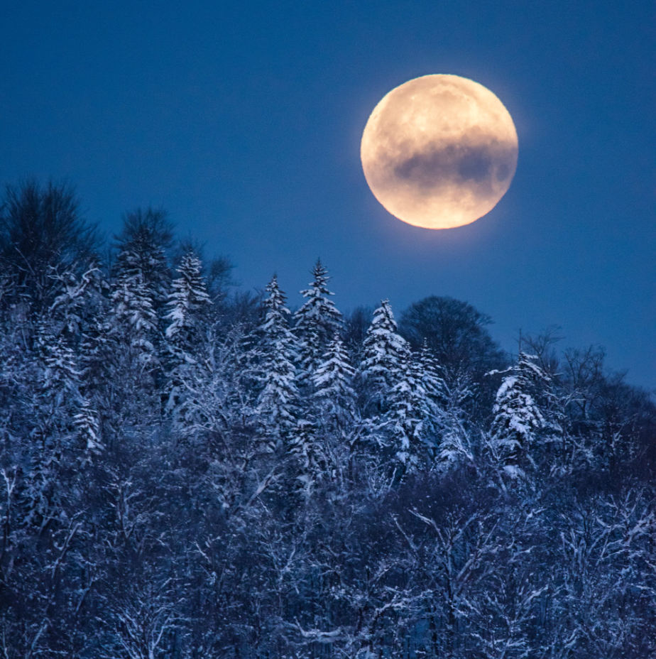 Moon above Bald Mountain in Old Forge NY.