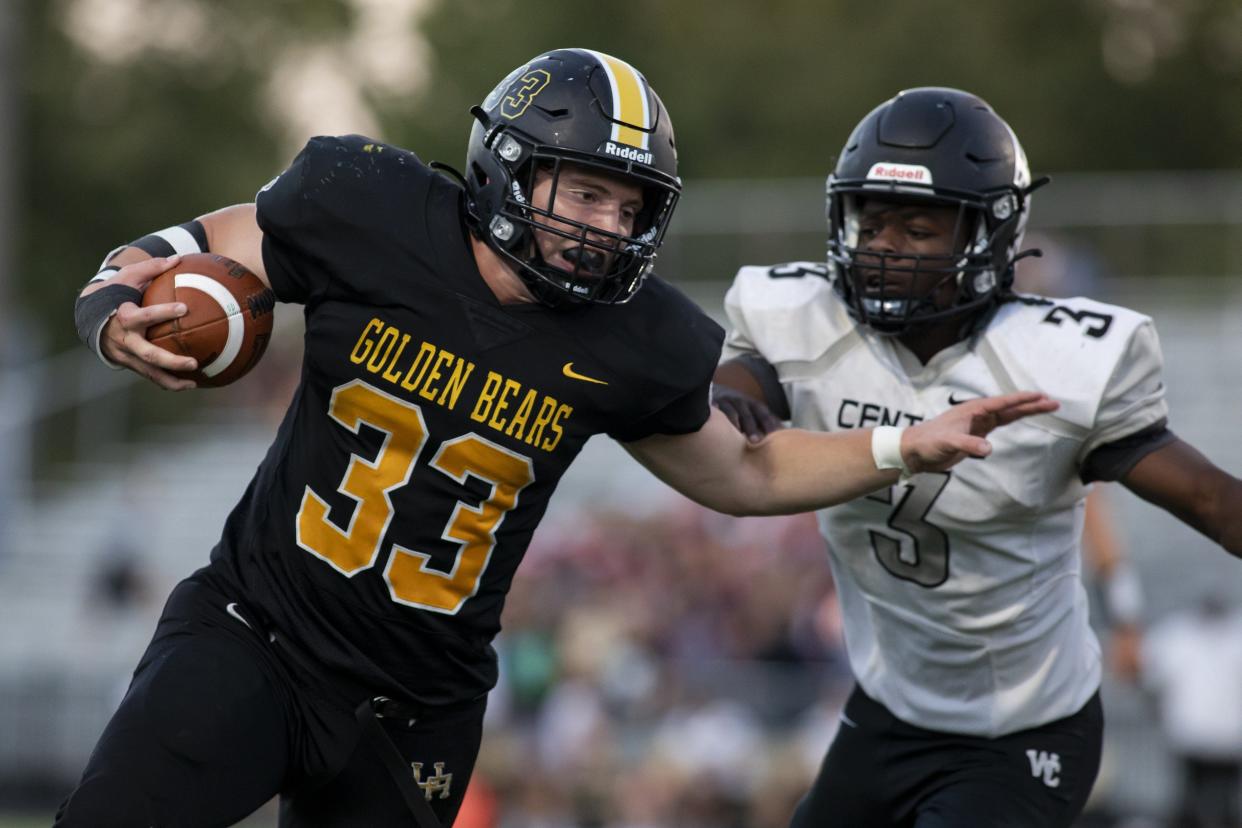 Carson Gresock carries the load for unbeaten Upper Arlington's offense.