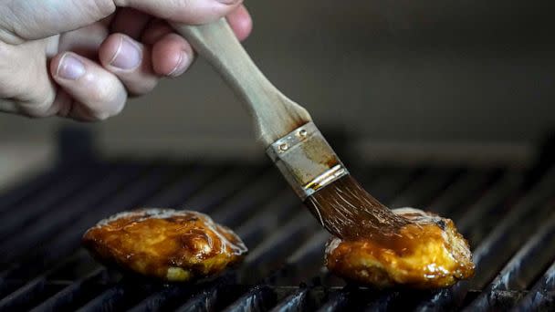 PHOTO: Chef Zach Tyndall prepares Good Meat's cultivated chicken at the Eat Just office in Alameda, Calif., June 14, 2023. (Jeff Chiu/AP)