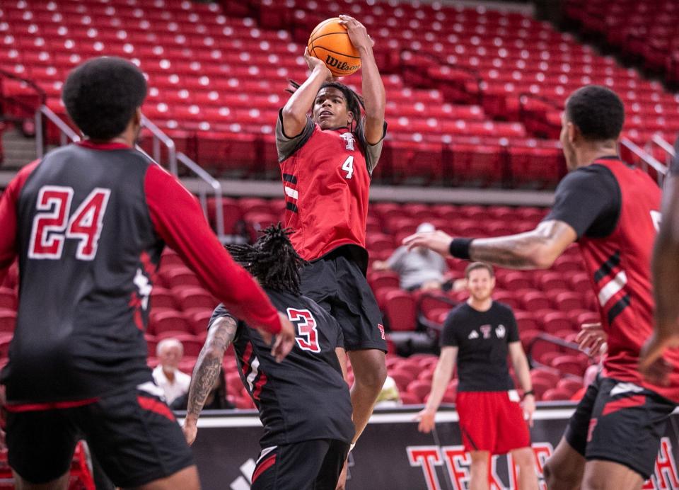 Christian Anderson shoots over the defense during Texas Tech basketball practice, Thursday, September 26, 2024, in United Supermarkets Arena.