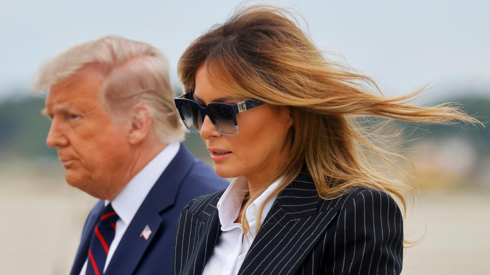 President Donald Trump walks with first lady Melania Trump at Cleveland Hopkins International Airport in Cleveland, Ohio on September 29, 2020. (Carlos Barria/Reuters)