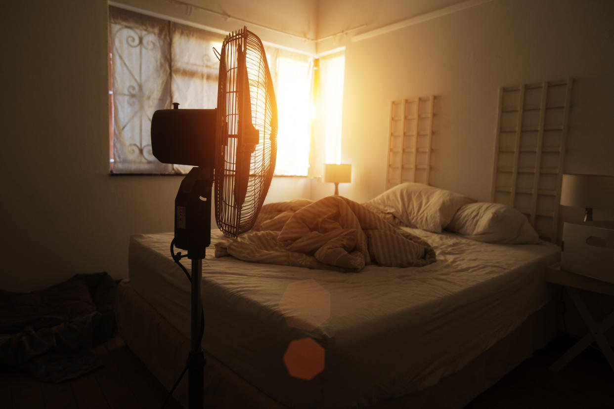 There are some health risks associated with sleeping with a fan on. (Getty Images)