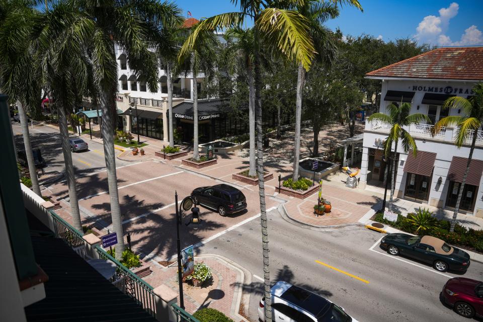 Cars travel along Fifth Avenue South in Naples on Thursday, Sept. 7, 2023.