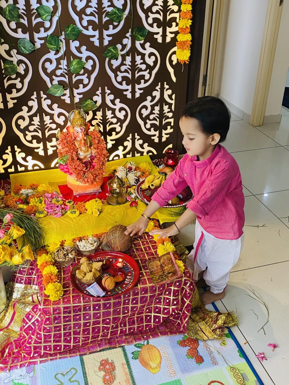 Puneet shared this picture of his son during Ganesha puja in their house.