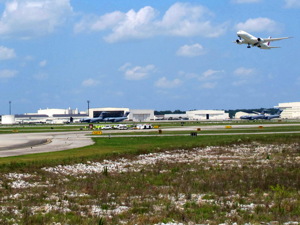 The first Boeing 787 manufactured in South Carolina takes off on its maiden flight from the Charleston International Airport in North Charleston, S.C., on Wednesday, May 23, 2012. It's the first plane manufactured at the $750 million assembly plant that opened last summer. (AP Photo/Bruce Smith)