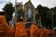 Thais mark new King's birthday with monks, stamps