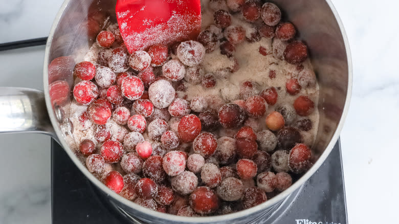 cranberries sugar in saucepan