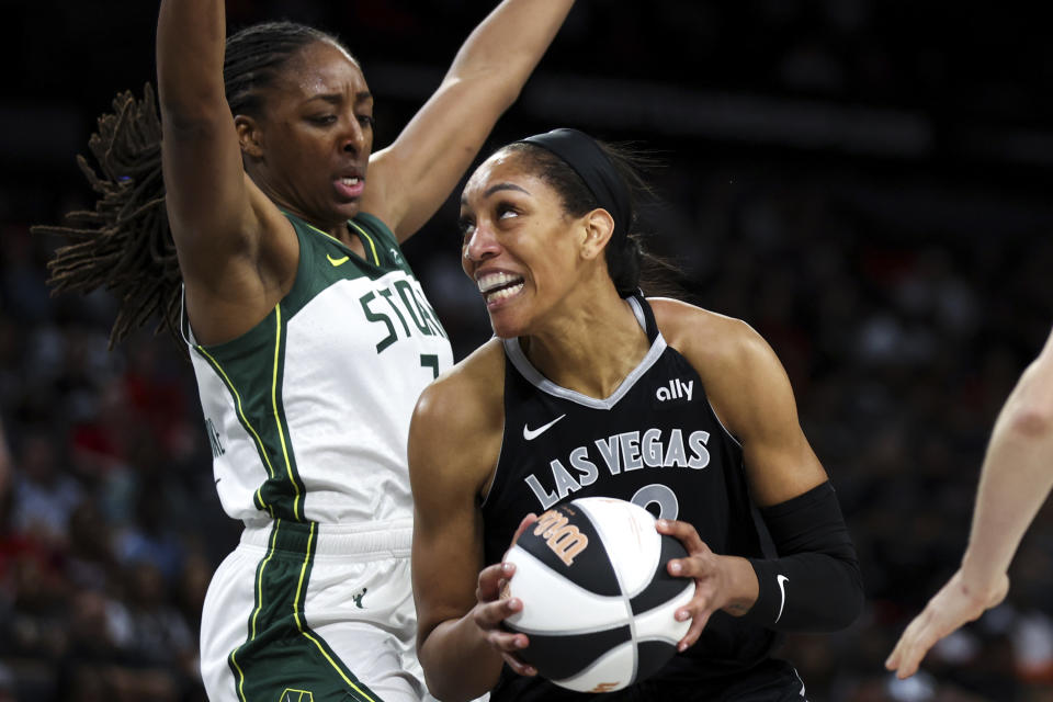 Las Vegas Aces center A'ja Wilson, right, is defended by Seattle Storm forward Nneka Ogwumike during the first half of a WNBA basketball game Friday, June 7, 2024, in Las Vegas. (Ellen Schmidt/Las Vegas Review-Journal via AP)