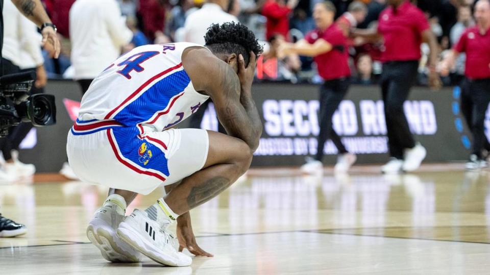 Kansas forward K.J. Adams Jr. (24) reacts after losing 72-71 to Arkansas in a second-round college basketball game in the NCAA Tournament Saturday, March 18, 2023, in Des Moines, Iowa.