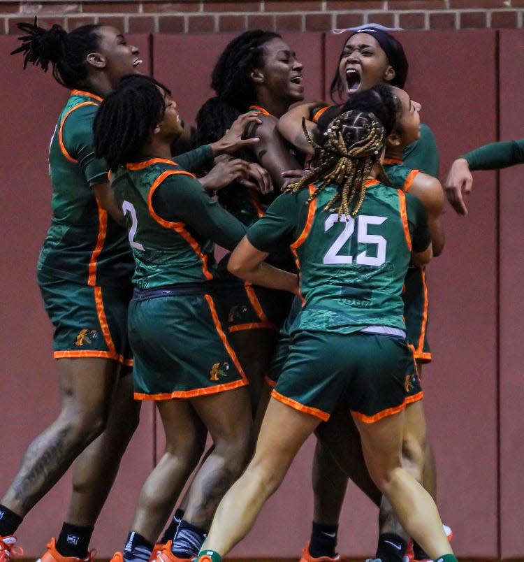 FAMU women’s basketball players celebrate after Maleaha Bell hits a buzzer-beater to defeat arch-rival Bethune-Cookman on Monday, Jan. 3, 2021.