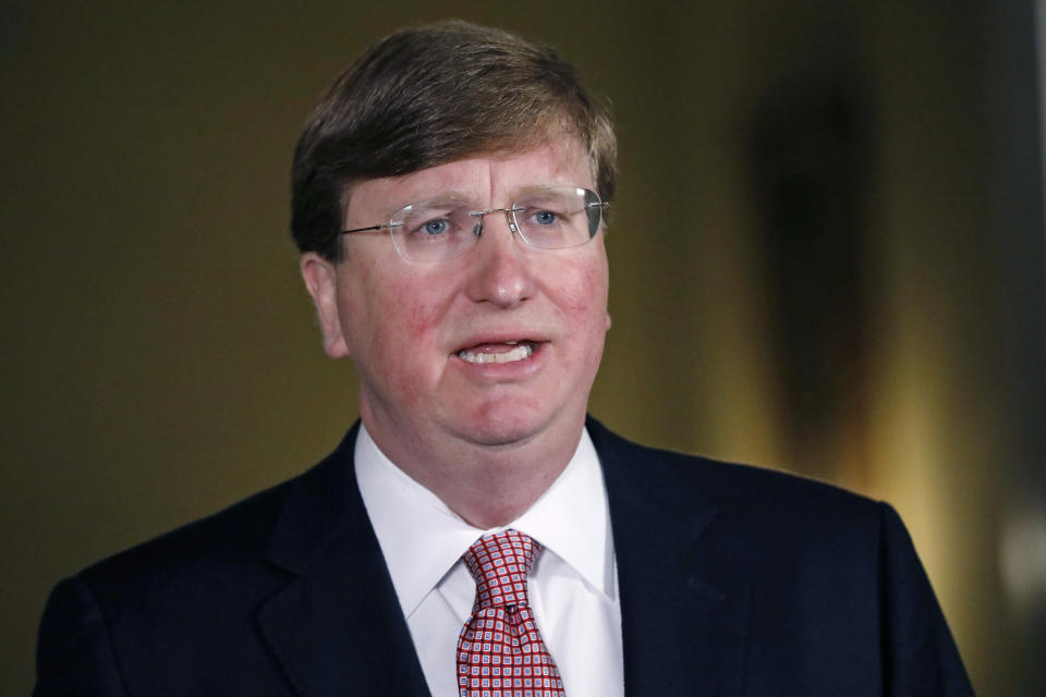 Mississippi Republican Gov. Tate Reeves delivers a televised address prior to signing a bill retiring the last state flag with the Confederate battle emblem during a ceremony at the Governor's Mansion in Jackson, Mississippi, on June 30, 2020. Upon signing the bill, the flag looses its official status. - Lawmakers in Mississippi voted June 28 to remove the Confederate battle standard from the state flag, after nationwide protests drew renewed attention to symbols of the United States' racist past. The measure passed with a 91-23 majority vote in the House of Representatives, triggering cheers in the Senate gallery. A few hours later, the Senate voted 37-14 for the bill. (Photo by Rogelio V. Solis / POOL / AFP) (Photo by ROGELIO V. SOLIS/POOL/AFP via Getty Images) (Photo: ROGELIO V. SOLIS via Getty Images)